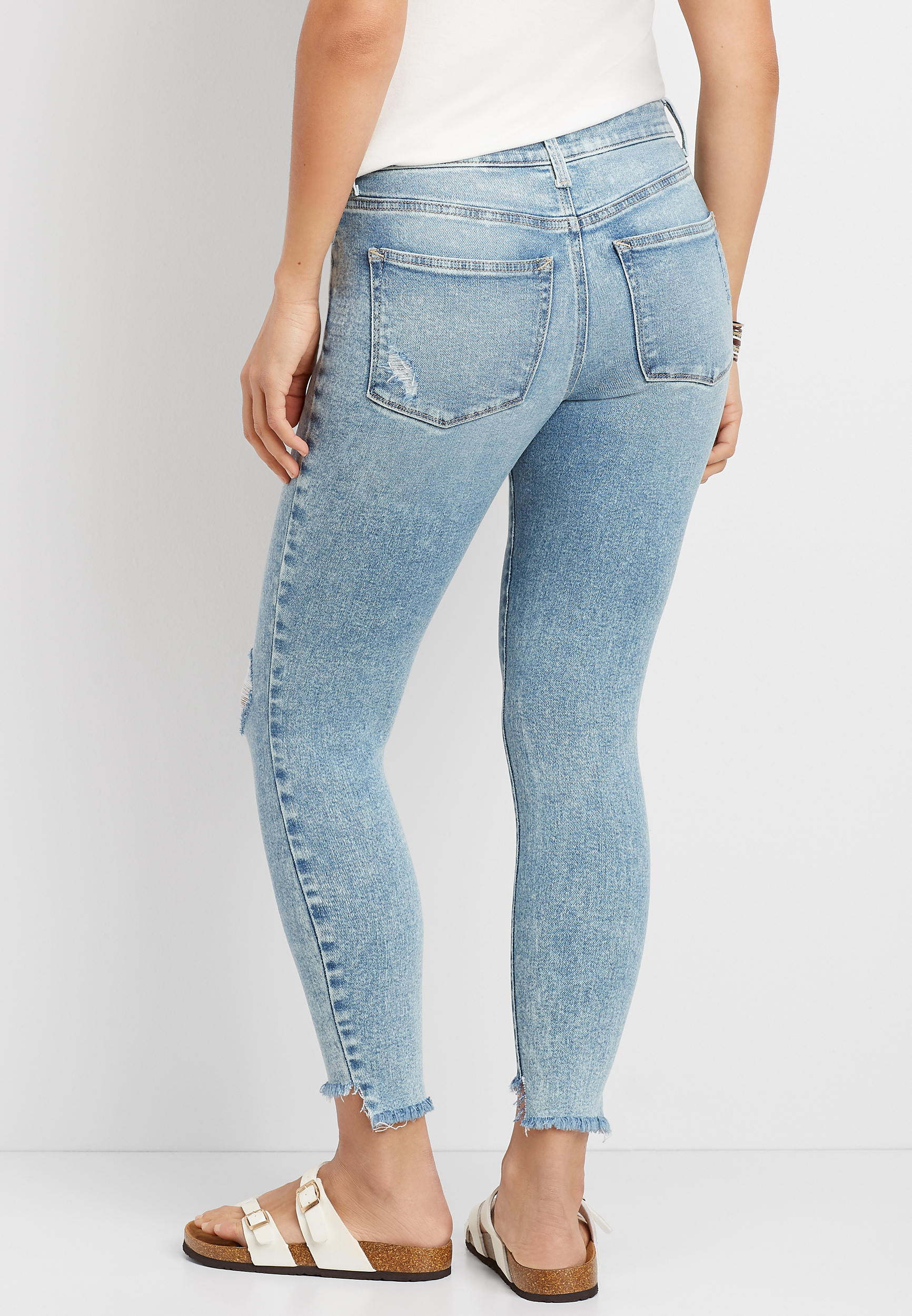 high waisted blue ripped jeans