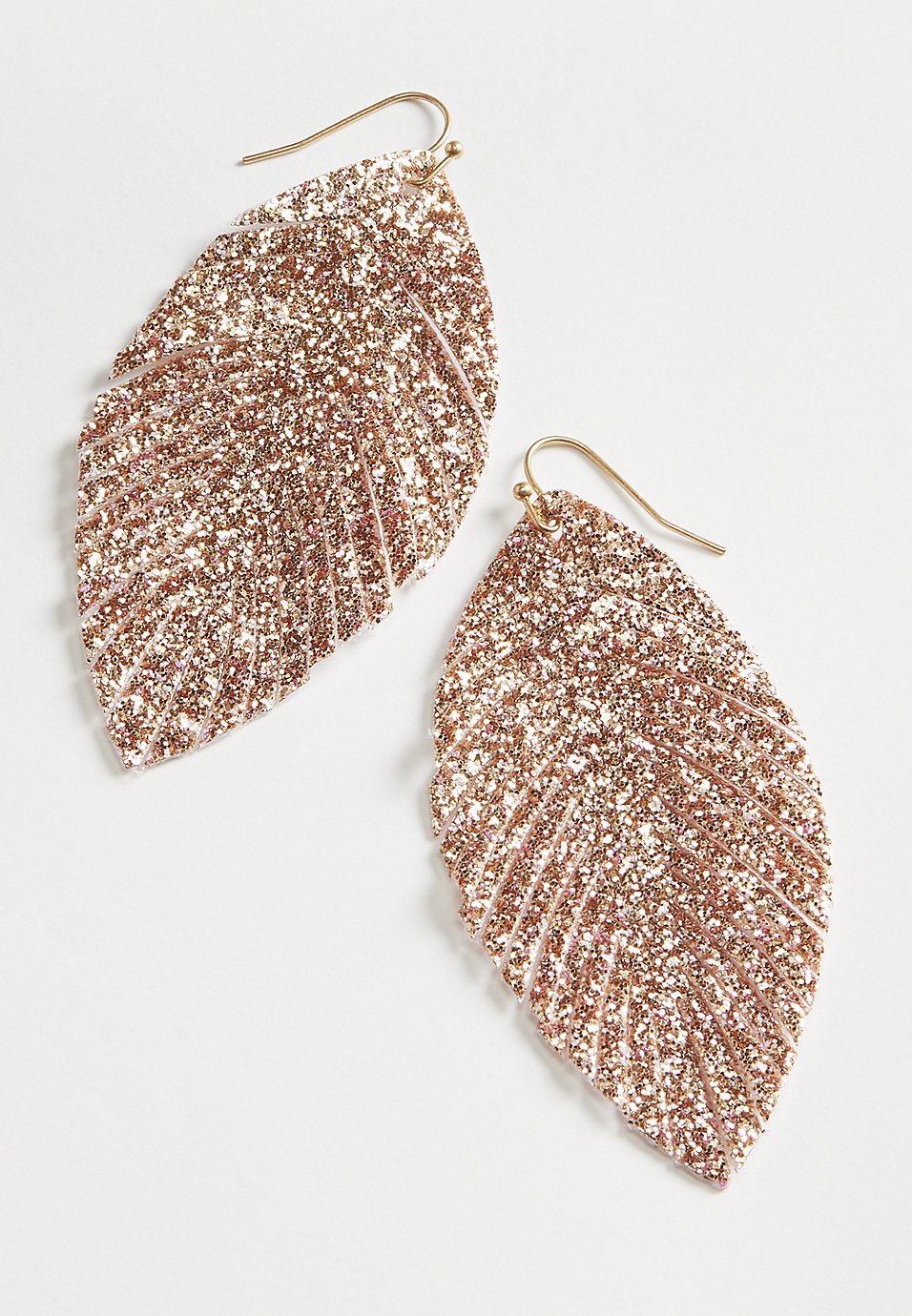 Steel rose gold with shimmer back earrings. Steel rose gold with shimmer back earrings.