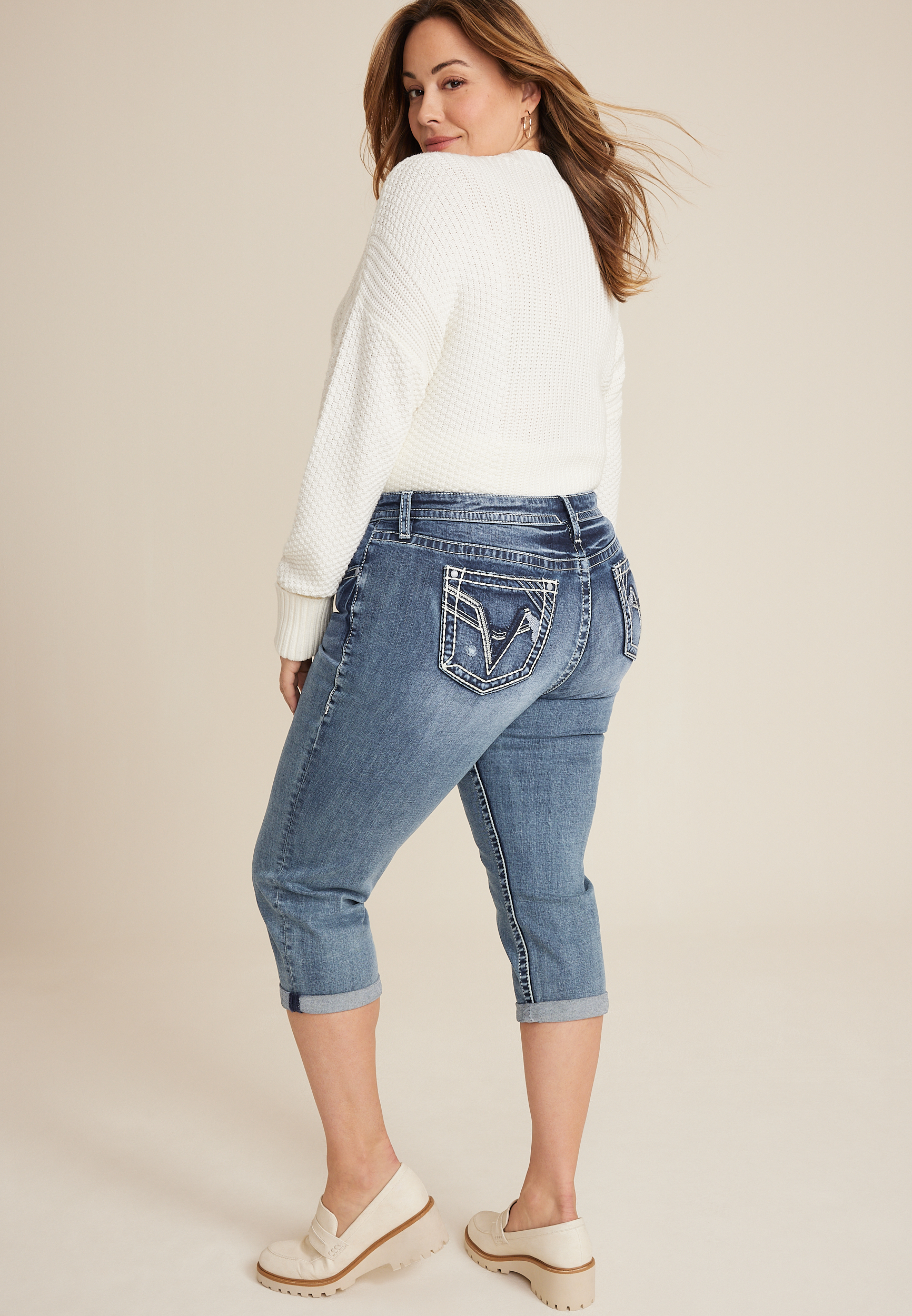 Plus-Size Mid-Rise Capri Jeggings. (6 Pack) • Faux front button closure •  Mid-rise • 5 Pockets • Faded color accents • Skinny capri leg • Super soft,  stretchy • Pull up styling