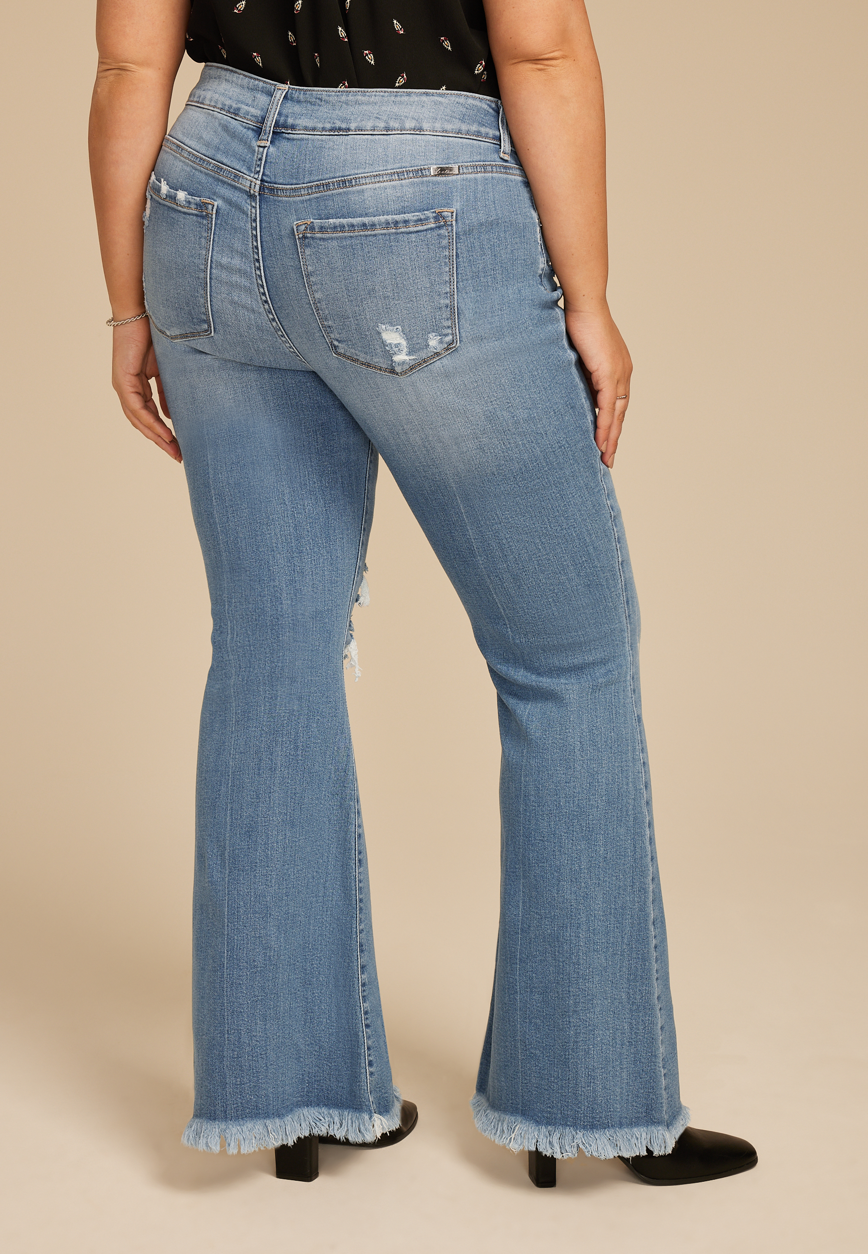 Plus Size KanCan™High Rise Open Ripped Flare Jean