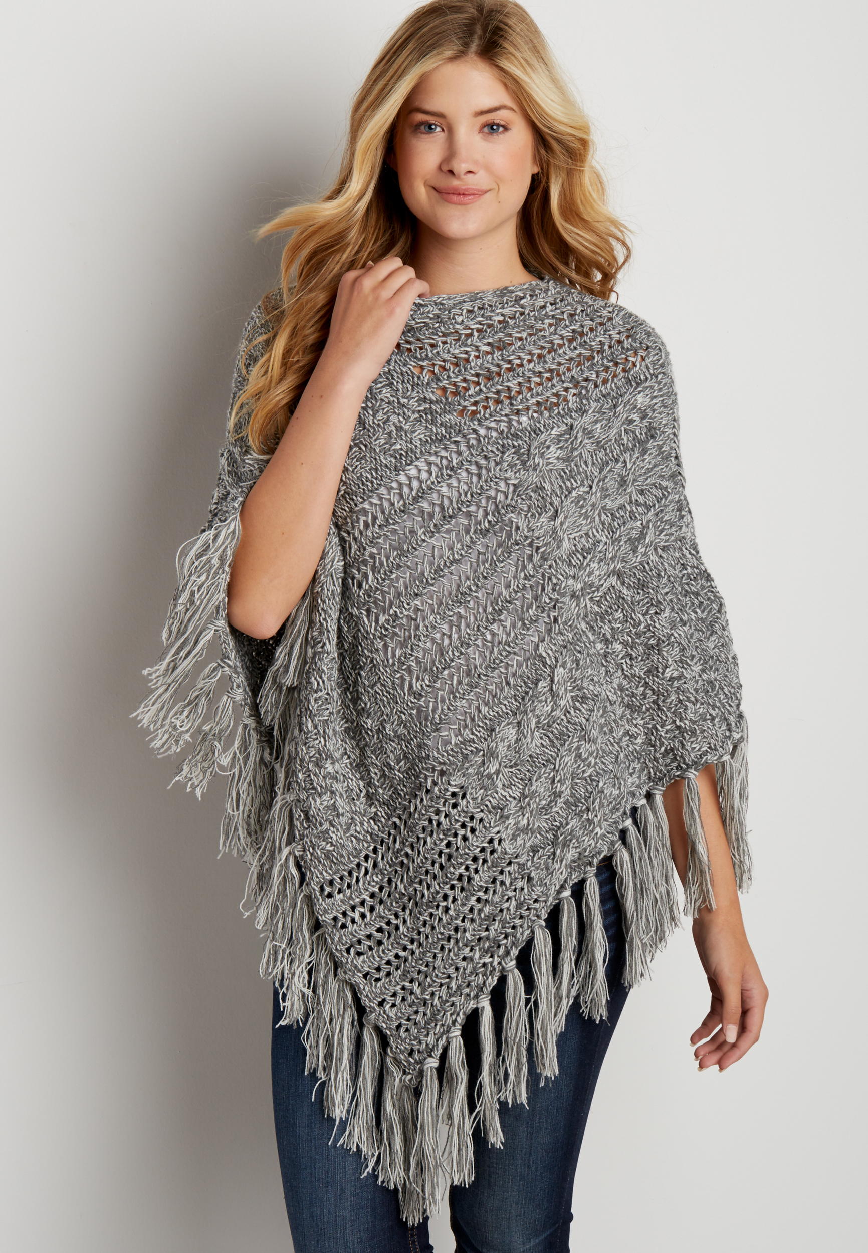 thick cable knit and open stitched poncho with fringe | maurices