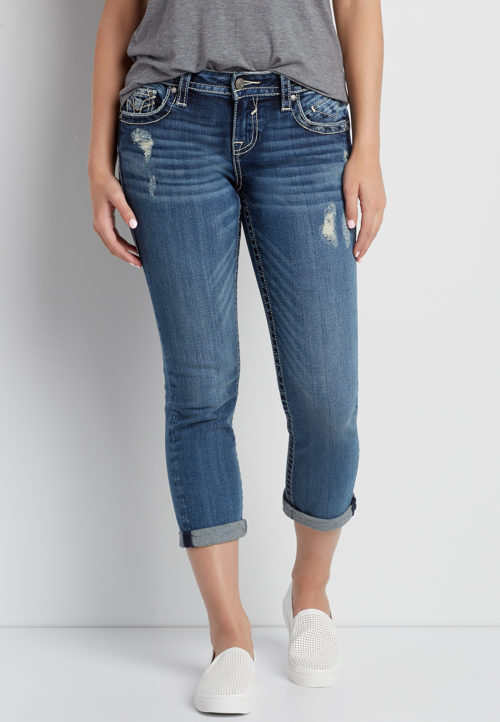 Vigoss® dark wash capri with light destruction | maurices