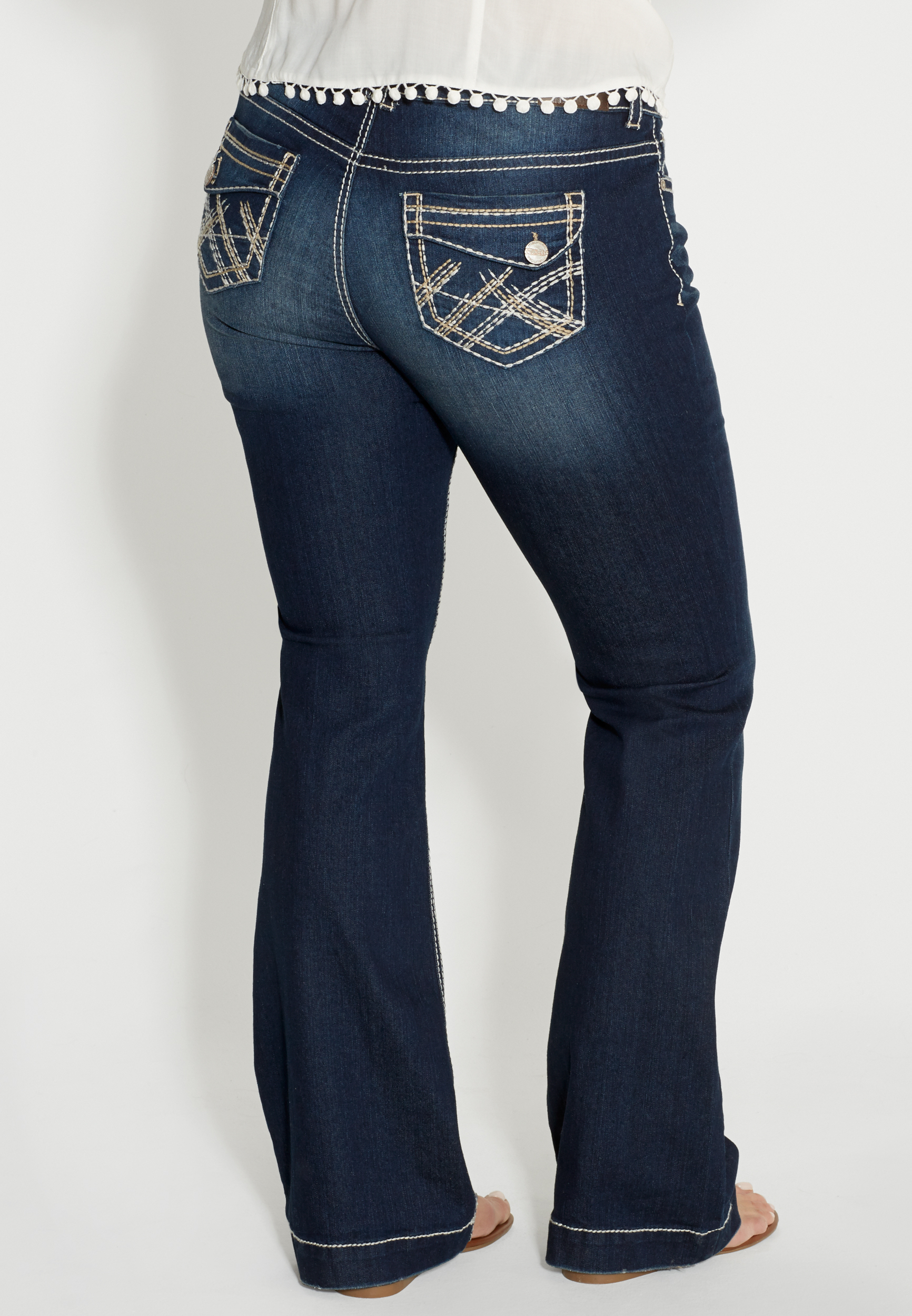 DenimFlex™ plus size flare jeans with asymmetrical back flap pockets