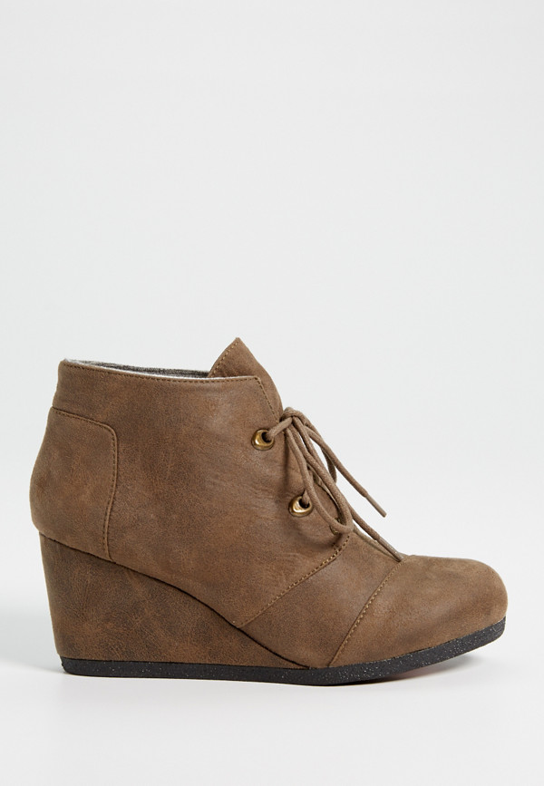 Darby distressed faux leather wedge bootie in olive | maurices